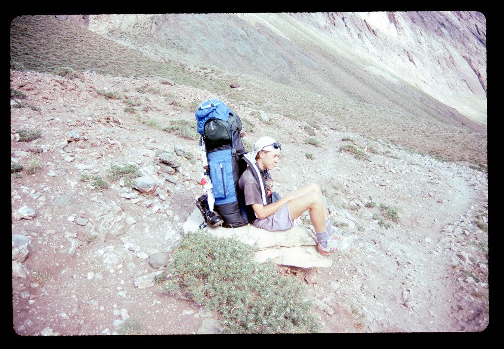 Adrián, taking a break from carrying his enormous pack