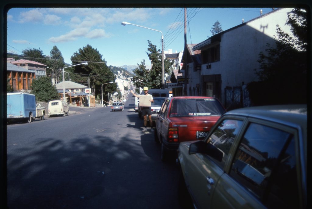 On the street in Bariloche with my hitchin' sign