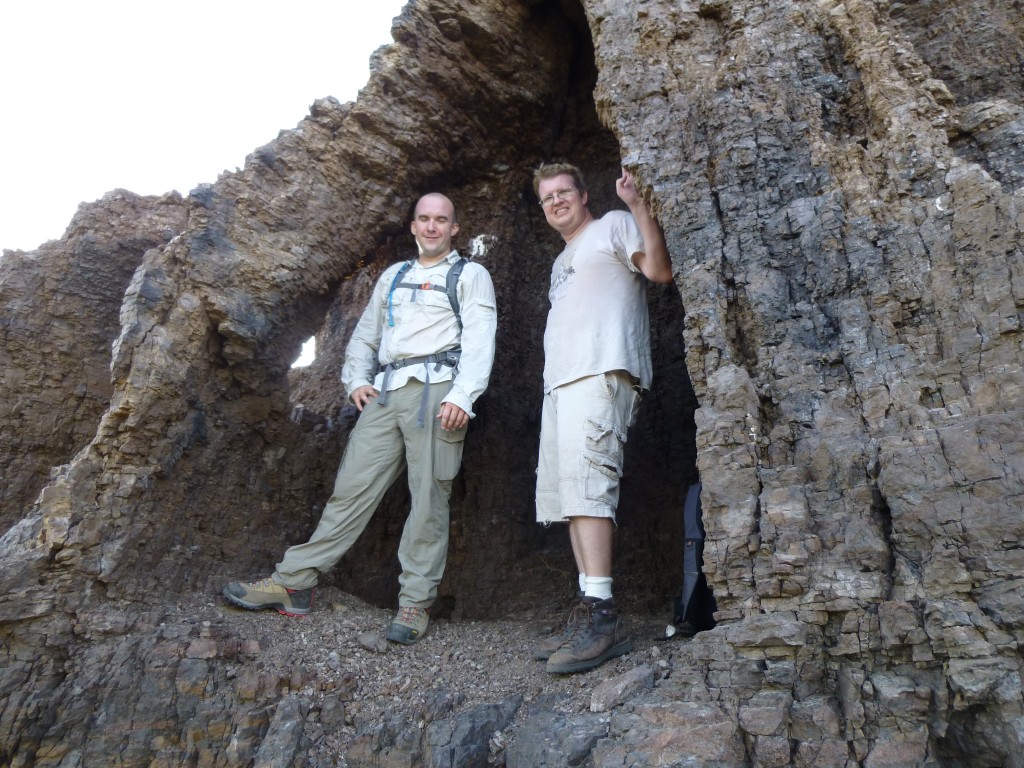 Jake and Andy standing in the cave beneath the summit.