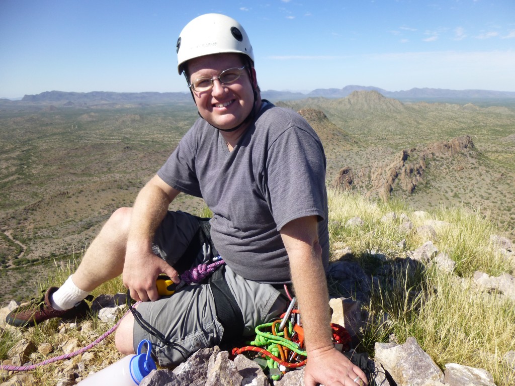Andy Bates on the summit of Ajo Peak
