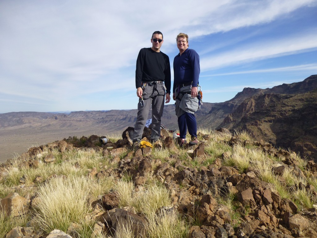 John (on the left) and Andy on the summit. The cairn is hidden behind John, and the PVC register is to the left of him on the ground.