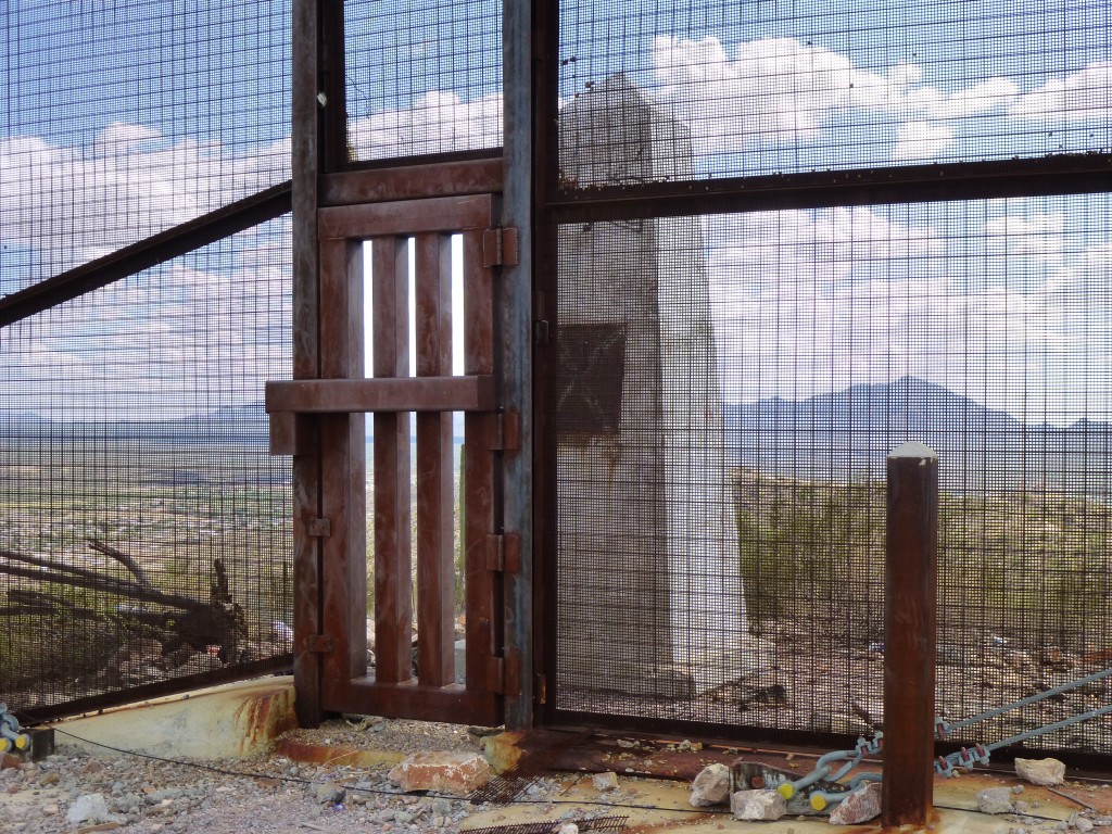 The border monument behind the closed door