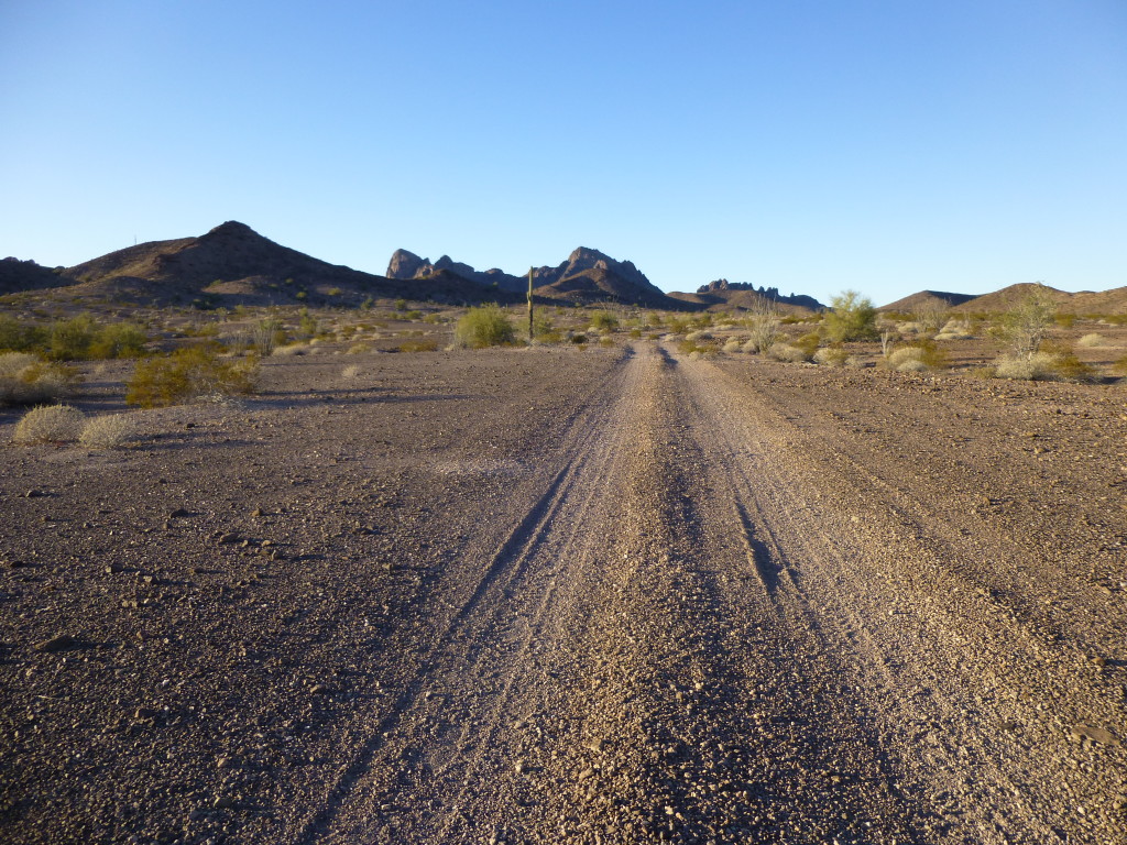 Walking back to camp on the old road, looking northwest to the heart of the central Aguila Mountains