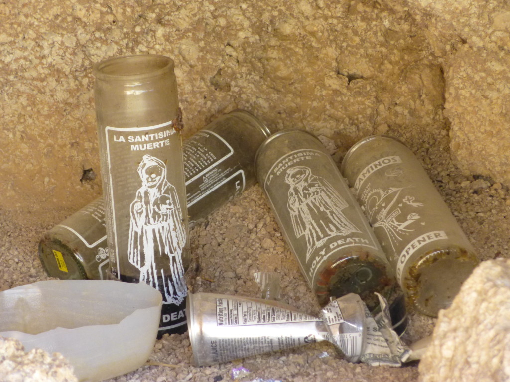 Votive candles in the cave.