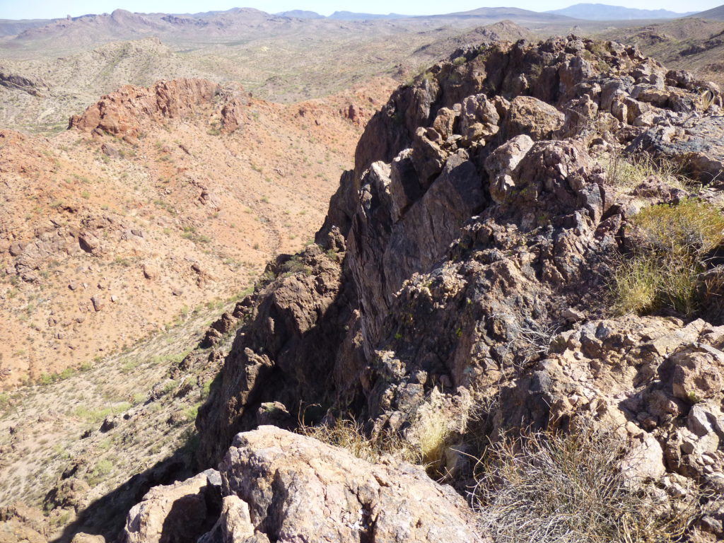 The steep north side of the peak is seen on the left.